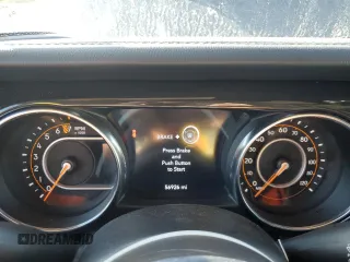 2020 Jeep Wrangler Unlimited Sahara Altitude z VIN 1C4HJXEG7LW312770, wystawiony jako Copart lot #81186294 z przebiegiem 56 926 mil mil oraz Szkoda całkowita • Salvage title. Historia ofert i sprzedaży dostępna na DreamBid. Obrazek 9.