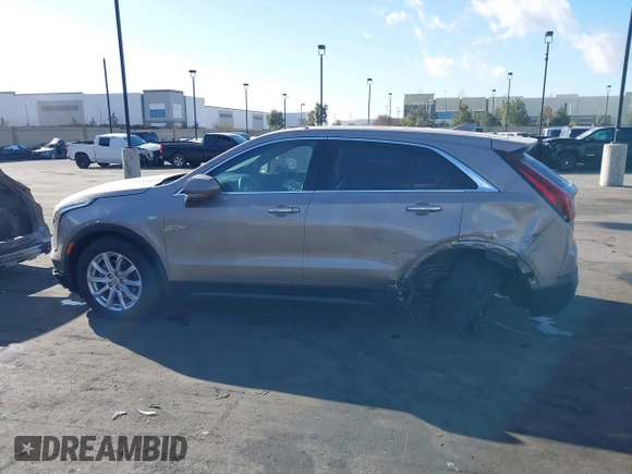 2023 Cadillac XT4 FWD Luxury z VIN 1GYAZAR40PF135132, wystawiony jako IAAI lot #41684609 z przebiegiem 12 164 mil mil oraz . Historia ofert i sprzedaży dostępna na DreamBid. Obrazek 15.