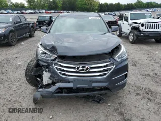 2018 Hyundai Santa Fe 2.4L z VIN 5XYZTDLB4JG553426, wystawiony jako Copart lot #54609875 z przebiegiem 93 328 mil mil oraz Szkoda całkowita • Salvage title. Historia ofert i sprzedaży dostępna na DreamBid. Obrazek 5.