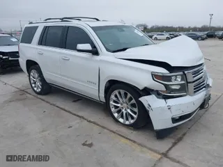 2019 Chevrolet Tahoe Premier with VIN 1GNSCCKJ4KR169077, listed as a IAAI auction lot 41548001 with 89,397 mi miles. Bid and sale history available at carsss.com. Image 1.