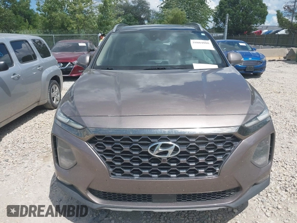 2020 Hyundai Santa Fe Limited with VIN 5NMS53AA5LH191809, listed as a IAAI auction lot 39804008 with 115,775 mi miles and . Bid and sale history available at DreamBid. Image 12.