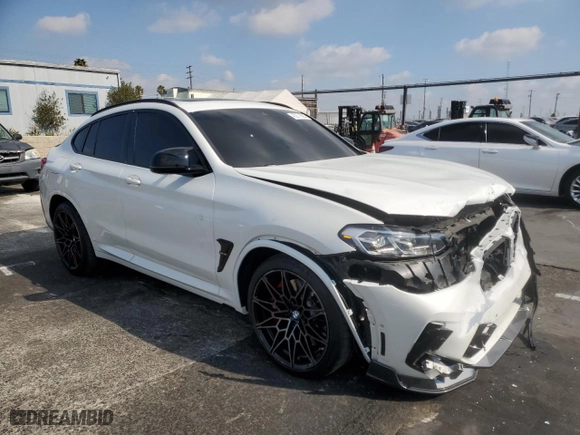 2022 BMW X4 M with VIN 5YM23EC01N9J82231, listed as a Copart auction lot 43271695 with 20715 miles and Salvage Title. Bid and sale history available at carsss.com. Image 4.