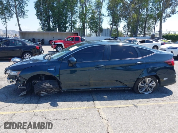 2018 Honda Clarity Plug-In Hybrid Touring with VIN JHMZC5F39JC022655, listed as a IAAI auction lot 42149002 with 118,913 mi miles. Bid and sale history available at carsss.com. Image 14.