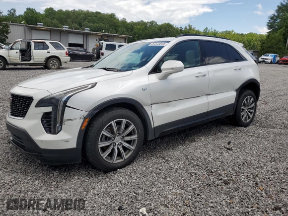 2019 Cadillac XT4 FWD Sport with VIN 1GYFZER44KF210582, listed as a Copart auction lot 61272015 with 104,073 mi miles and Salvage title. Bid and sale history available at DreamBid. Image 1.
