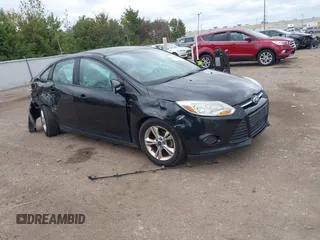 2014 Ford Focus SE with VIN 1FADP3F2XEL293022, listed as a IAAI auction lot 40737196 with 188,228 mi miles. Bid and sale history available at carsss.com. Image 1.