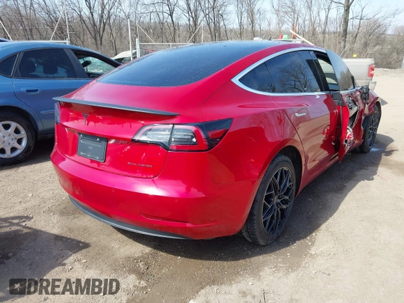 2020 Tesla Model 3 Long Range with VIN 5YJ3E1EB9LF666066, listed as a IAAI auction lot 41759976 with 69,323 mi miles. Bid and sale history available at carsss.com. Image 4.