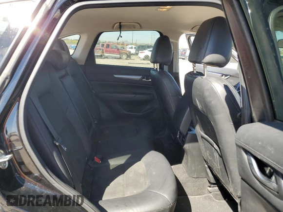 2017 Mazda CX-5 Touring z VIN JM3KFBCL4H0184922, wystawiony jako Copart lot #50166195 z przebiegiem 86 270 mil mil oraz Szkoda całkowita • Salvage title. Historia ofert i sprzedaży dostępna na DreamBid. Obrazek 10.