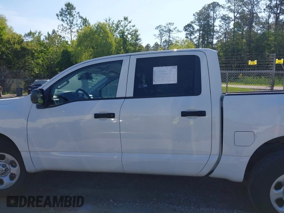2023 Nissan Titan SV with VIN 1N6AA1EC1PN114674, listed as a IAAI auction lot 42141106 with 18,271 mi miles and . Bid and sale history available at DreamBid. Image 14.