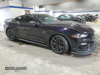 2022 Ford Mustang Mach 1 с VIN 1FA6P8R06N5551850, выставлен на аукционе Copart как лот 82197174 с пробегом 13 294 миль миль и Списание • Salvage title. История ставок и продаж доступна на DreamBid. Изображение 4.