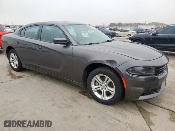 2022 Dodge Charger SXT with VIN 2C3CDXBG3NH182742, listed as a Copart auction lot 55236895 with 83,345 mi miles and Clean Title. Bid and sale history available at DreamBid. Image 4.