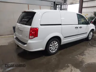 2014 Ram Cargo Van Tradesman with VIN 2C4JRGAG5ER341034, listed as a IAAI auction lot 41194609 with 156,772 mi miles. Bid and sale history available at carsss.com. Image 4.