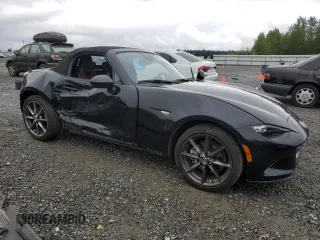 2021 Mazda MX-5 Miata Grand Touring with VIN JM1NDAD78M0455899, listed as a Copart auction lot 57347125 with 38,405 mi miles and Salvage title. Bid and sale history available at DreamBid. Image 4.