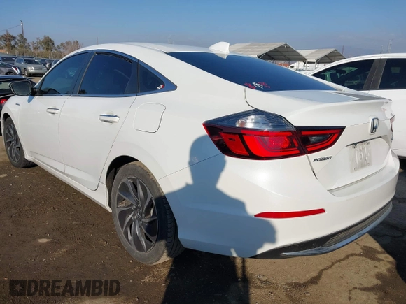 2022 Honda Insight Touring with VIN 19XZE4F95NE017767, listed as a IAAI auction lot 41450899 with 28,015 mi miles and . Bid and sale history available at carsss.com. Image 3.