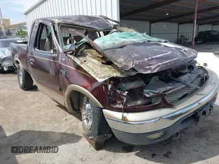 2000 Ford F-150 XL with VIN 1FTRX18L2YNB87229, listed as a IAAI auction lot 42041368 with 84,956 mi miles. Bid and sale history available at carsss.com. Image 1.