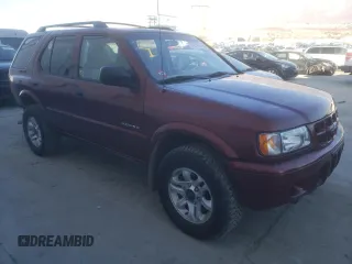 2002 Isuzu Rodeo S with VIN 4S2DM58W824313096, listed as a Copart auction lot 77951364 with 127,470 mi miles and Salvage Title. Bid and sale history available at DreamBid. Image 4.
