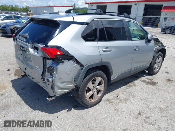 2021 Toyota RAV4 Hybrid LE with VIN 2T3B6RFV2MW018967, listed as a IAAI auction lot 42601989 with 71,046 mi miles and . Bid and sale history available at DreamBid. Image 4.