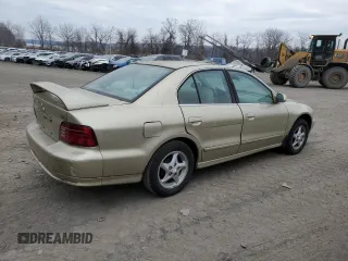 2001 Mitsubishi Galant ES z VIN 4A3AA46G51E020677, wystawiony jako Copart lot #87795655 z przebiegiem 61 145 mil mil oraz Tytuł czysty. Historia ofert i sprzedaży dostępna na DreamBid. Obrazek 3.