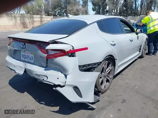 2018 Kia Stinger GT1 with VIN KNAE45LC7J6034168, listed as a IAAI auction lot 41979658 with 111,854 mi miles. Bid and sale history available at carsss.com. Image 4.