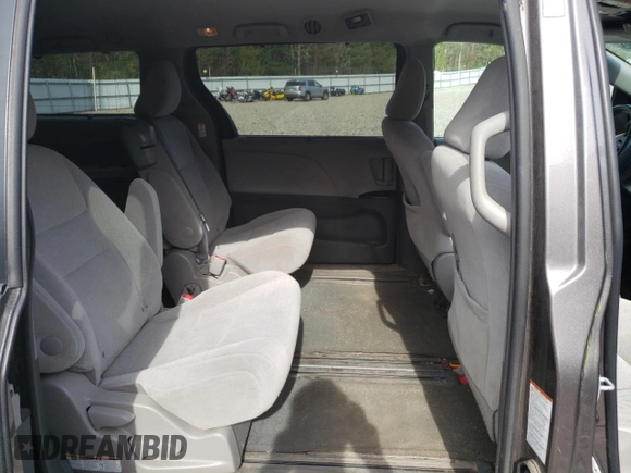 2016 Toyota Sienna LE AAS с VIN 5TDKK3DCXGS748822, выставлен на аукционе Copart как лот 56615505 с пробегом 128 191 миль миль и Списание • Salvage title. История ставок и продаж доступна на DreamBid. Изображение 11.