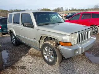 2007 Jeep Commander Sport with VIN 1J8HH48PX7C673318, listed as a IAAI auction lot 41585570 with 188,977 mi miles. Bid and sale history available at carsss.com. Image 1.