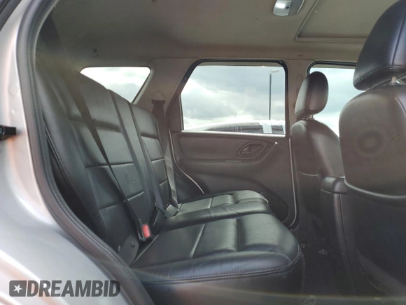 2005 Ford Escape Limited with VIN 1FMCU94165KA11181, listed as a Copart auction lot 62880725 with 180,152 mi miles and Salvage title. Bid and sale history available at DreamBid. Image 11.