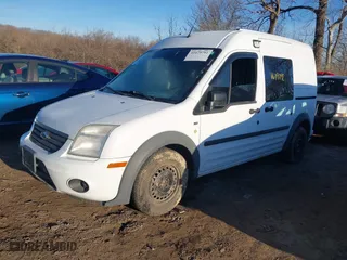 2013 Ford Transit Connect XLT with VIN NM0LS6BN2DT170025, listed as a IAAI auction lot 41679792 with 142,624 mi miles. Bid and sale history available at carsss.com. Image 2.