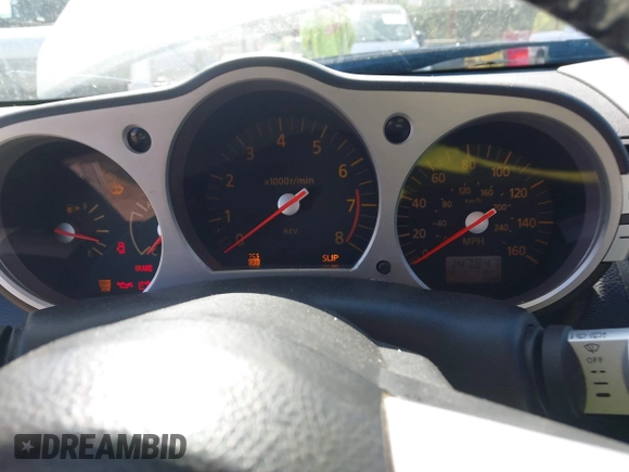 2003 Nissan 350Z Touring z VIN JN1AZ34E03T004458, wystawiony jako IAAI lot #42361684 z przebiegiem 147 847 mil mil oraz . Historia ofert i sprzedaży dostępna na DreamBid. Obrazek 7.
