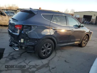 2015 Hyundai Santa Fe z VIN 5XYZU3LB3FG235795, wystawiony jako Copart lot #82047494 z przebiegiem 80 623 mil mil oraz Szkoda całkowita • Salvage title. Historia ofert i sprzedaży dostępna na DreamBid. Obrazek 3.