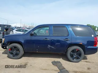 2012 Chevrolet Tahoe Commercial z VIN 1GNLC2E02CR315009, wystawiony jako IAAI lot #42525280 z przebiegiem 232 254 mil mil oraz . Historia ofert i sprzedaży dostępna na DreamBid. Obrazek 14.