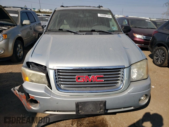 2007 GMC Envoy SLT with VIN 1GKDS13S572158514, listed as a Copart auction lot 74208144 with 209,797 mi miles and Salvage Title. Bid and sale history available at carsss.com. Image 5.