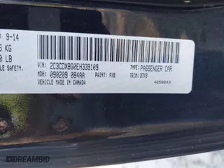 2014 Dodge Charger SE with VIN 2C3CDXBG0EH339109, listed as a IAAI auction lot 41823433 with 115,746 mi miles. Bid and sale history available at carsss.com. Image 9.