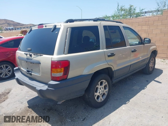 2001 Jeep Grand Cherokee Laredo with VIN 1J4GX48S01C606559, listed as a IAAI auction lot 42384286 with 149,146 mi miles and . Bid and sale history available at DreamBid. Image 4.