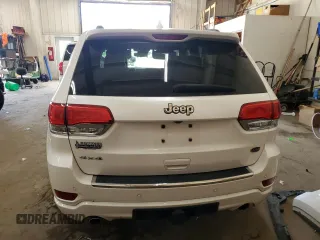 2017 Jeep Grand Cherokee Overland z VIN 1C4RJFCG8HC809868, wystawiony jako Copart lot #64056155 z przebiegiem 54 136 mil mil oraz Szkoda całkowita • Salvage title. Historia ofert i sprzedaży dostępna na DreamBid. Obrazek 6.
