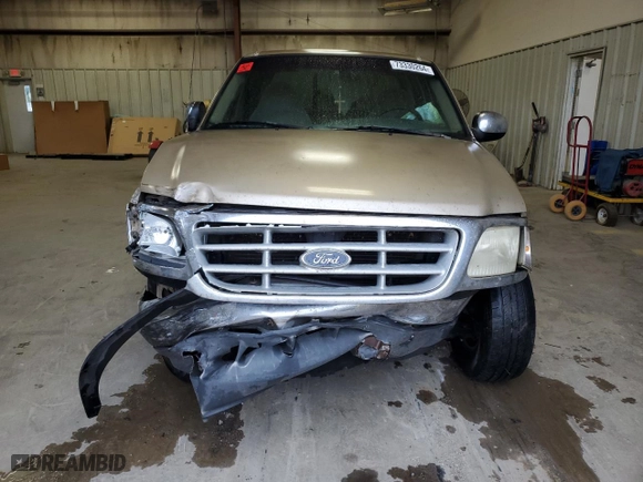 1999 Ford F-150 Work Series with VIN 1FTZX1720XNA76671, listed as a Copart auction lot 73330264 with 0 mi miles and Salvage Title. Bid and sale history available at carsss.com. Image 5.
