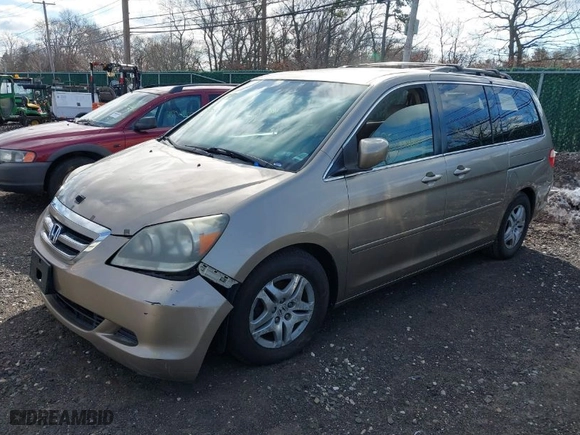 2007 Honda Odyssey EX-L with VIN 5FNRL38747B120025, listed as a IAAI auction lot 41594313 with 999999 miles. Bid and sale history available at carsss.com. Image 2.