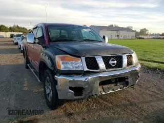 2006 Nissan Titan LE z VIN 1N6BA07B86N546972, wystawiony jako Copart lot #74983924 z przebiegiem 225 495 mil mil oraz Szkoda całkowita • Salvage title. Historia ofert i sprzedaży dostępna na DreamBid. Obrazek 11.