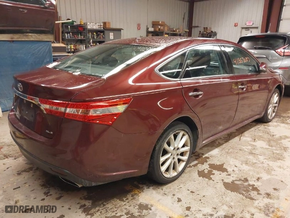 2013 Toyota Avalon XLE with VIN 4T1BK1EB0DU059112, listed as a IAAI auction lot 41553083 with 137,544 mi miles. Bid and sale history available at carsss.com. Image 4.