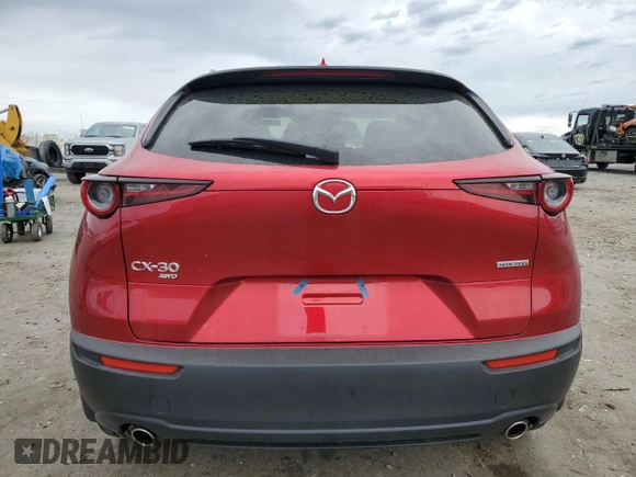 2024 Mazda CX-30 S Premium z VIN 3MVDMBDM0RM693109, wystawiony jako Copart lot #51951985 z przebiegiem 10 449 mil mil oraz Szkoda całkowita • Salvage title. Historia ofert i sprzedaży dostępna na DreamBid. Obrazek 6.