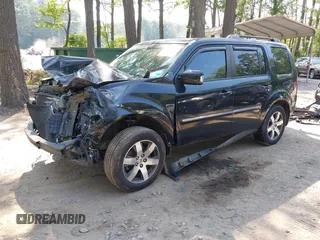 2013 Honda Pilot Touring with VIN 5FNYF3H96DB011470, listed as a IAAI auction lot 42535022 with 201,380 mi miles and . Bid and sale history available at DreamBid. Image 2.