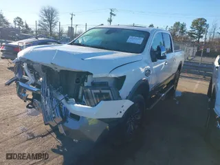 2023 Nissan Titan XD PRO-4X with VIN 1N6AA1FB2PN111269, listed as a IAAI auction lot 41253693 with 9,929 mi miles. Bid and sale history available at carsss.com. Image 2.
