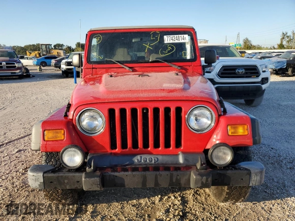 2003 Jeep Wrangler Sport with VIN 1J4FA49S43P332645, listed as a Copart auction lot 77424814 with 165,909 mi miles and Non Repairable. Bid and sale history available at carsss.com. Image 5.