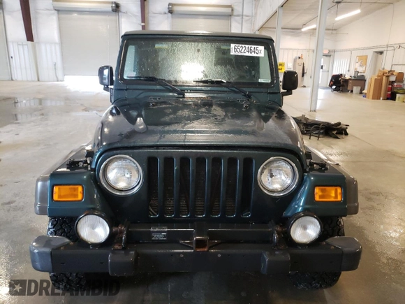 2005 Jeep Wrangler Sport with VIN 1J4FA49S35P341517, listed as a Copart auction lot 65224645 with 153,832 mi miles and Clean title. Bid and sale history available at DreamBid. Image 5.