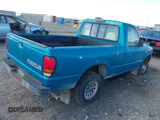 1995 Mazda B-Series Truck z VIN 4F4CR12A0STM09915, wystawiony jako IAAI lot #41773728 z przebiegiem 90 000 mil mil oraz . Historia ofert i sprzedaży dostępna na DreamBid. Obrazek 4.