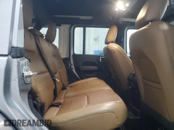 2021 Jeep Wrangler Unlimited Sahara with VIN 1C4JJXP65MW682462, listed as a Copart auction lot 58673385 with 38,714 mi miles and Salvage title. Bid and sale history available at DreamBid. Image 10.