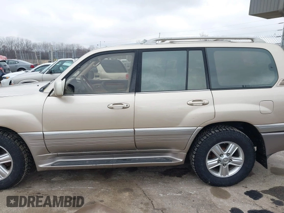 1999 Lexus LX 470 z VIN JT6HT00W8X0045705, wystawiony jako IAAI lot #42005587 z przebiegiem 443 758 mil mil oraz . Historia ofert i sprzedaży dostępna na DreamBid. Obrazek 14.