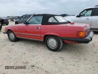 1986 Mercedes-Benz 560 SL with VIN WDBBA48D8GA054377, listed as a Copart auction lot 45391915 with 98,728 mi miles and Salvage Title. Bid and sale history available at DreamBid. Image 2.