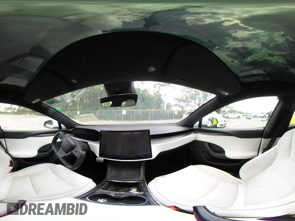 2022 Tesla Model S Plaid with VIN 5YJSA1E61NF460155, listed as a IAAI auction lot 42545167 with 51,711 mi miles and . Bid and sale history available at DreamBid. Image 19.