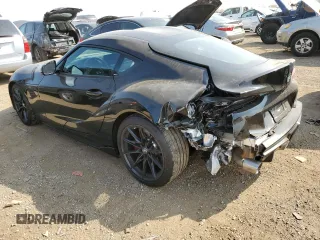 2023 Toyota GR Supra 3.0 with VIN WZ1DB0G06PW060990, listed as a Copart auction lot 70827384 with 4,326 mi miles and Salvage Title. Bid and sale history available at carsss.com. Image 2.