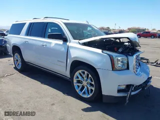 2018 GMC Yukon XL Denali with VIN 1GKS2HKJ2JR183877, listed as a IAAI auction lot 41652039 with 123,075 mi miles. Bid and sale history available at carsss.com. Image 1.