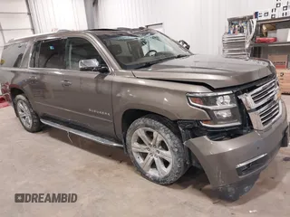 2016 Chevrolet Suburban LTZ with VIN 1GNSKJKC2GR463013, listed as a IAAI auction lot 41972468 with 136,246 mi miles and . Bid and sale history available at DreamBid. Image 1.